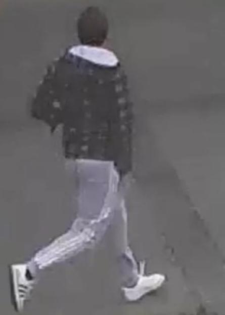 CCTV image of a man police wish to speak to.