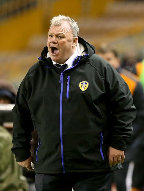 Steve Evans, Leeds United manager, shouting on the sidelines.