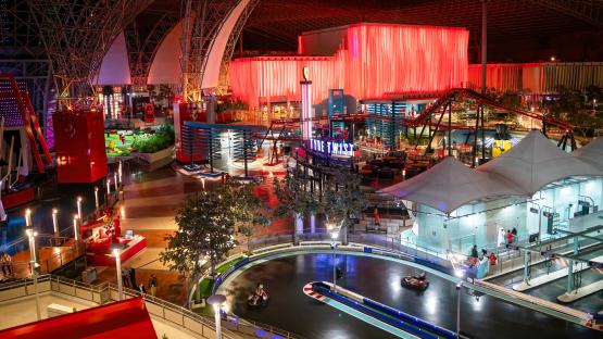 Interior view of Ferrari World Abu Dhabi at night.
