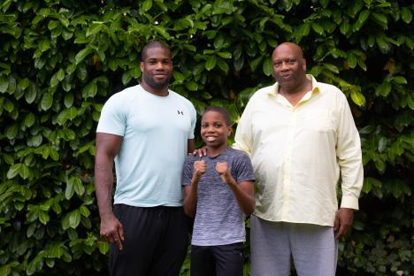 Boxer Daniel Dubois with his father and brother.