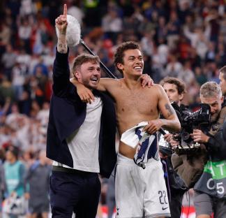 James Maddison and Brennan Johnson of Tottenham Hotspur celebrating their Europa League victory.