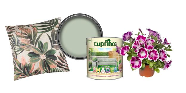 Tropical leaf print cushion, paint can, and petunias.