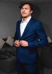 Man in a blue suit.