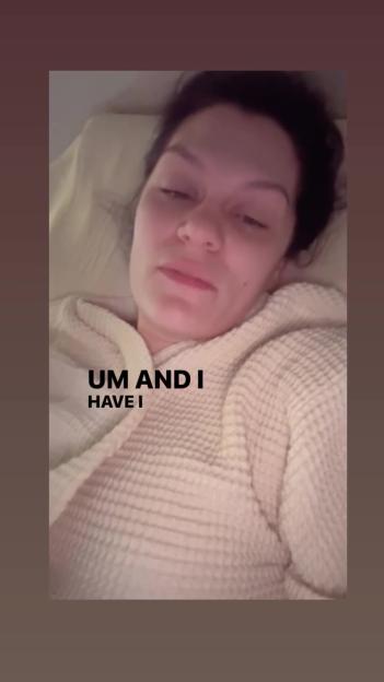 Jessie J in bed, sharing a hospital update.