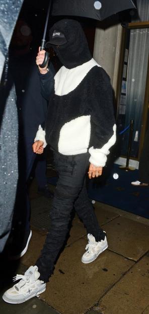 Can You Identify the Arsenal Star Sporting a £1,360 Outfit During Team Bonding Night?