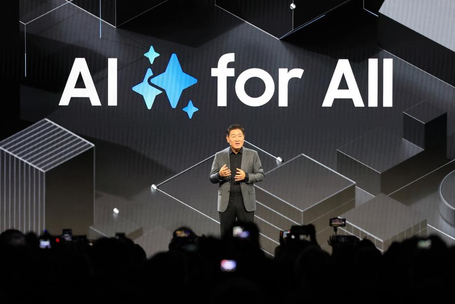 Samsung executive speaking at CES 2025 press conference about AI.