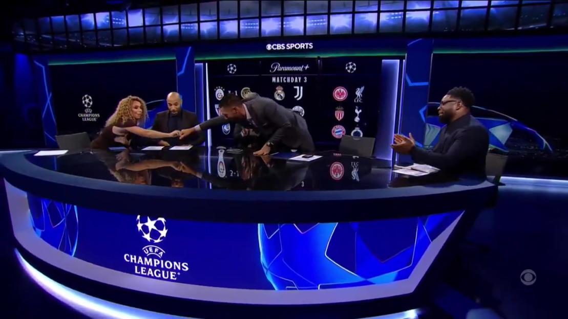 Kate Scott saving a man from a wardrobe malfunction live on CBS Sports