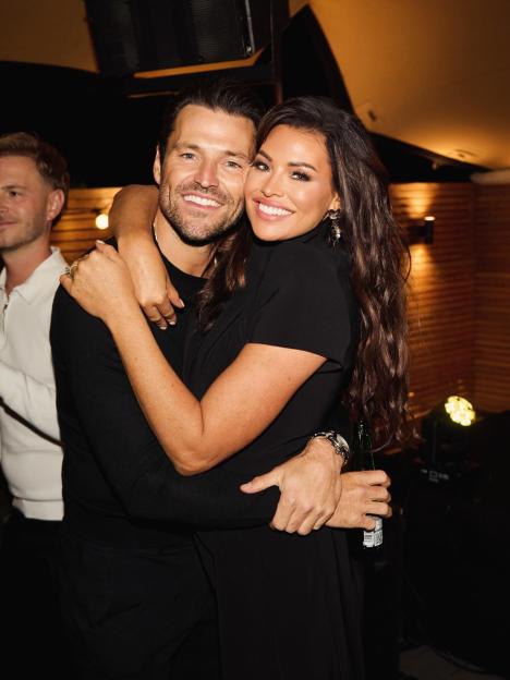 Michelle Keegan and Mark Wright hugging.