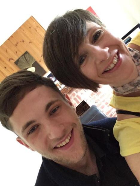 Ryan Long and a woman smiling.