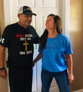 Jocelynn and Terrell smiling together.