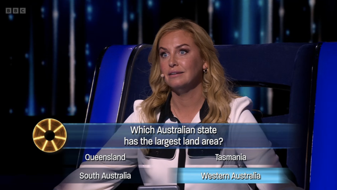 Screenshot of a game show contestant considering the question: "Which Australian state has the largest land area?" Options include Queensland, Tasmania, South Australia, and Western Australia.
