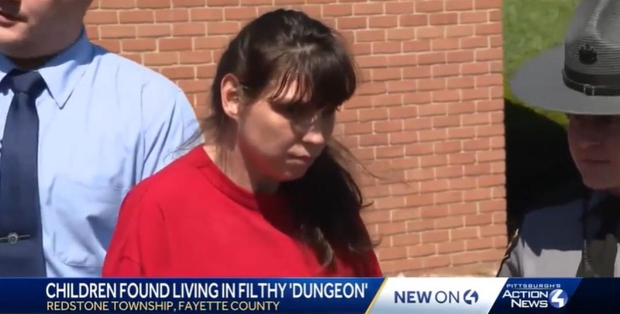 Woman in custody after five children are found living in deplorable conditions.