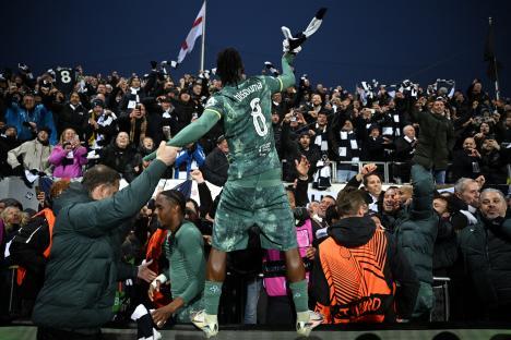 Yves Bissouma of Tottenham Hotspur celebrates with fans after a victory.
