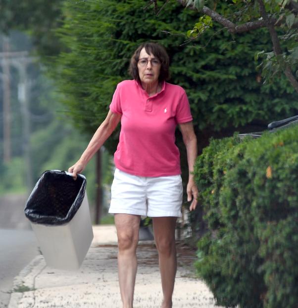 Didi Conn taking out the trash.