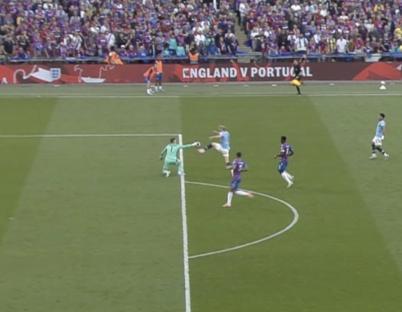 Soccer game, England vs Portugal. A goalkeeper makes a save.