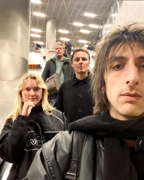 The Horrors on an escalator.