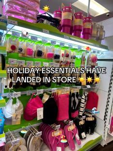 Store display of beach holiday essentials.