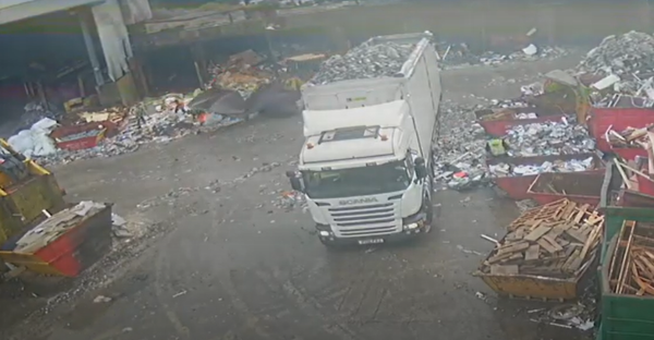 Garbage truck at a recycling center.