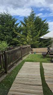 Bamboo fencing added to a garden fence for privacy.