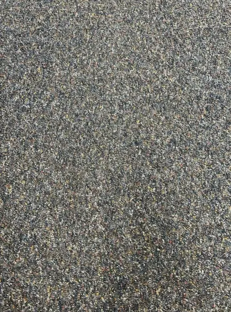 Close-up of speckled carpet.