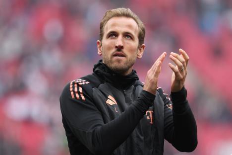 Harry Kane finally WINS first trophy as Bayer Leverkusen draw hands Bayern Munich title hours after they were denied