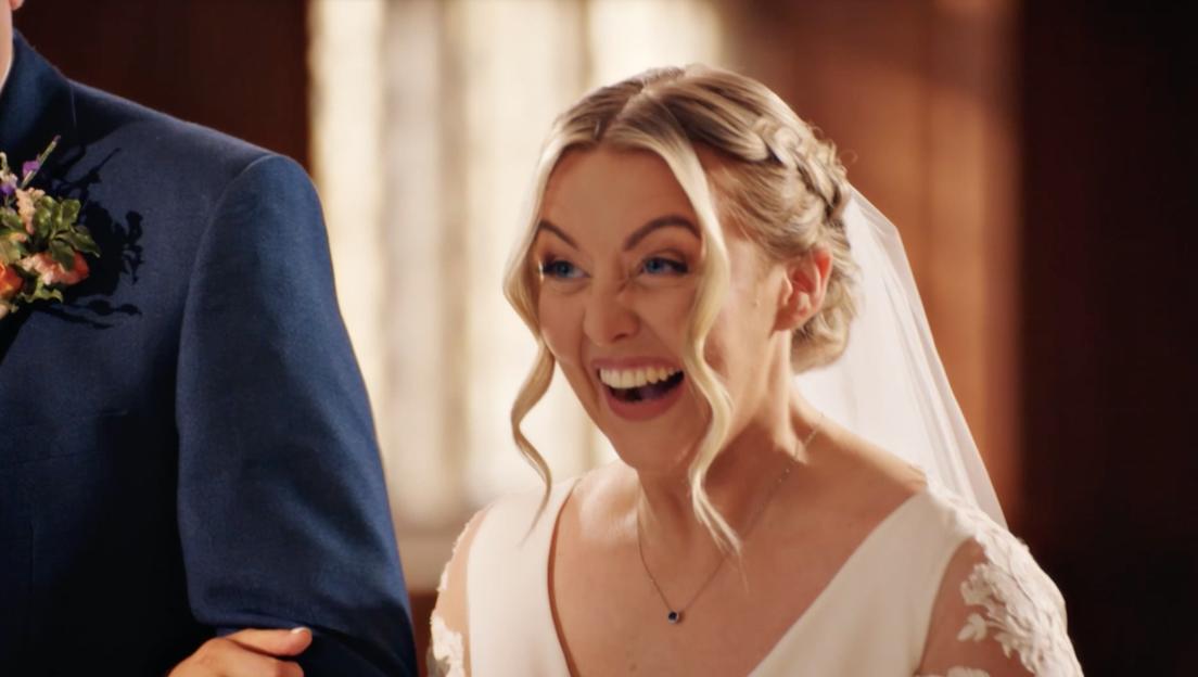 A laughing bride at her wedding.