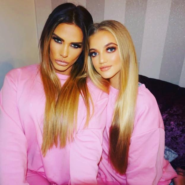 Princess Andre and her mother, Katie Price, wearing matching pink sweatshirts.