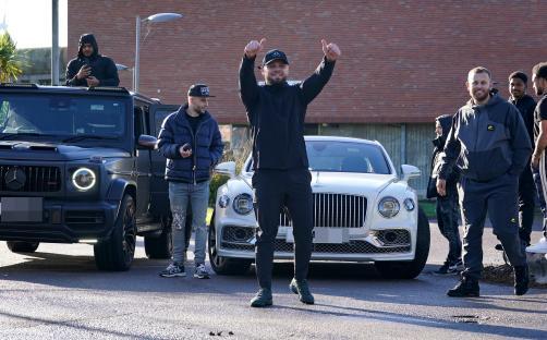 A man gives a thumbs-up as he is released from prison.