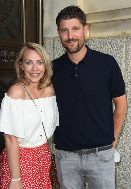 Laura Hamilton and Alex Goward attend a gala night.