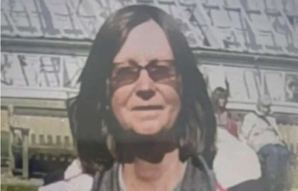 Photo of a woman wearing sunglasses.