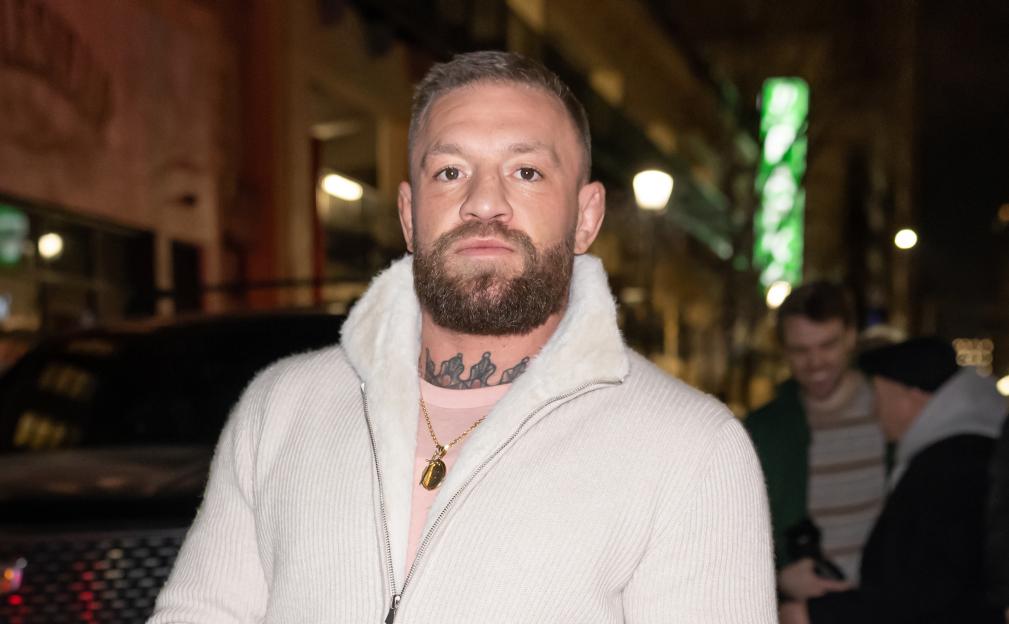 Conor McGregor breaks silence with four-word post after ‘nudes were posted’ & UFC champ pictured kissing mystery woman 