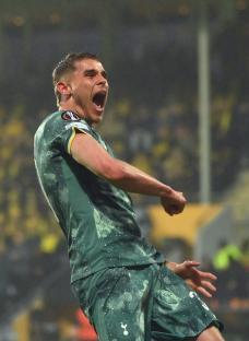 Micky van de Ven of Tottenham Hotspur celebrating a goal.