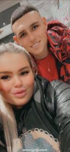 Phil Foden with a woman.