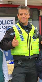 PC Lorne Castle giving a thumbs up.