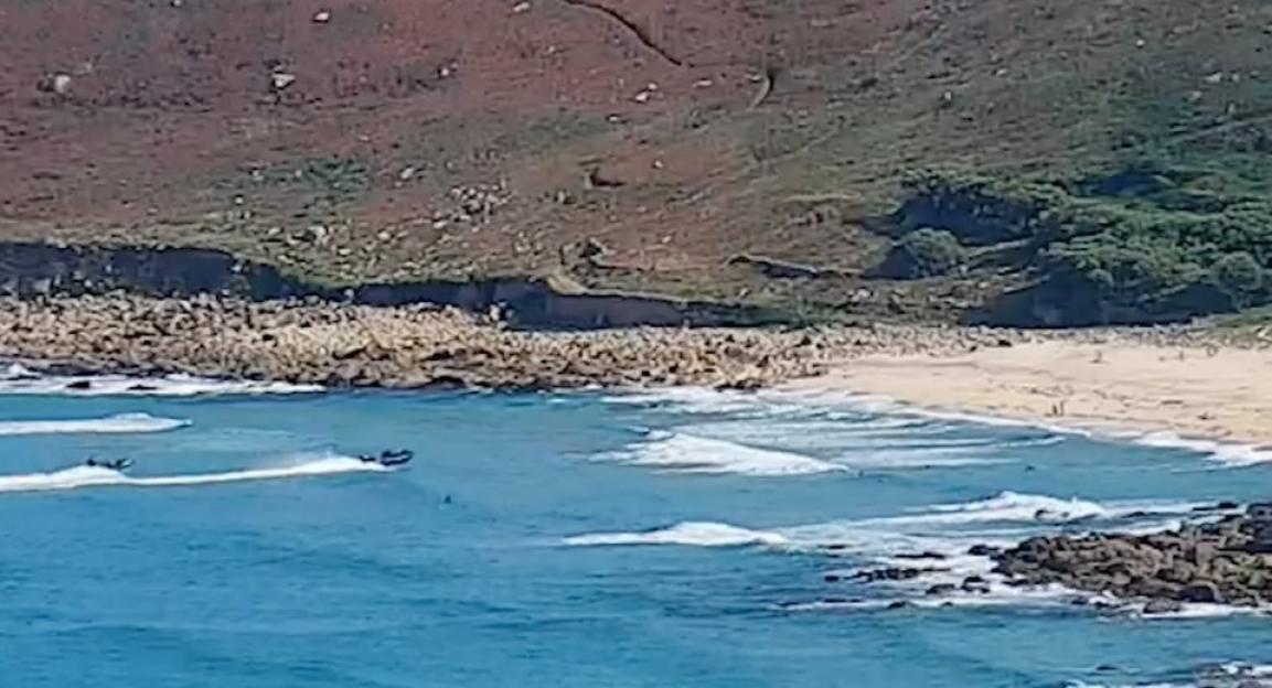 Drugs gang are jailed after shocking video shows cop chase on popular UK beach in front of stunned sunbathers