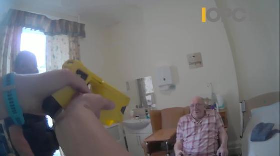 Bodycam footage of police tasering a 92-year-old man in a wheelchair.