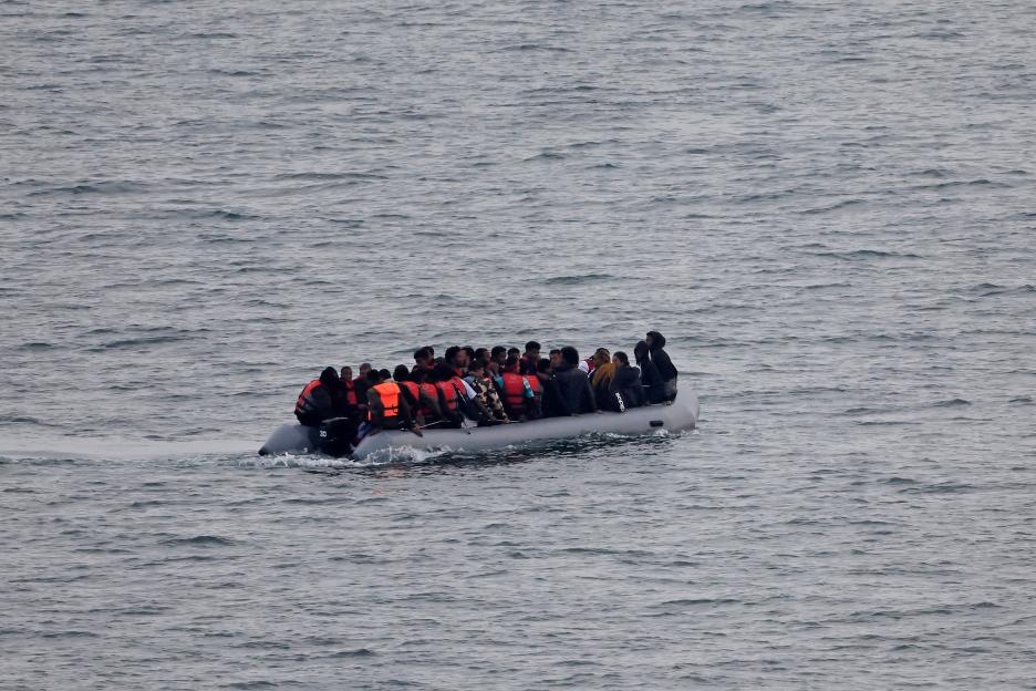 A group of migrants in an inflatable dinghy trying to cross the English Channel.