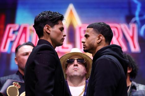 Ryan Garcia and Rolando Romero facing off at a press conference.
