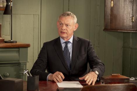 Martin Clunes as Dr. Martin Ellingham.