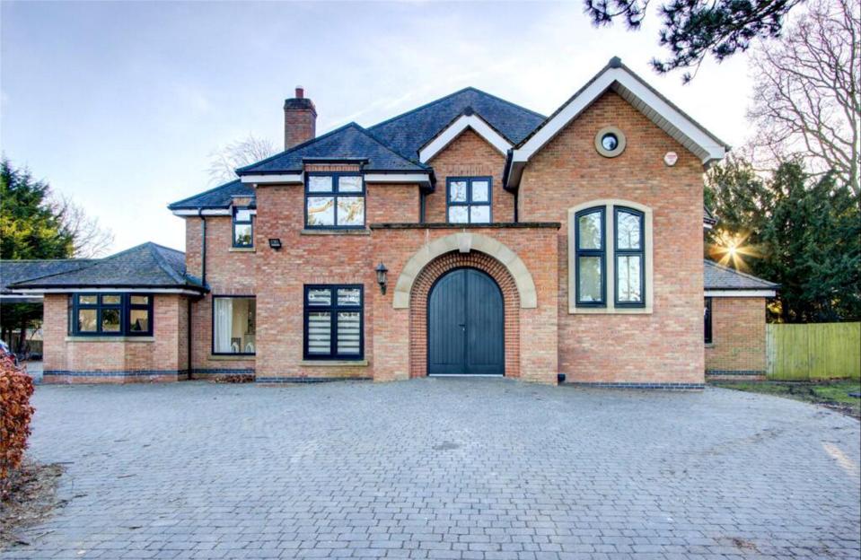 Photo of Charlotte Crosby's mansion, on the market for £1.4 million, featuring a cinema, gym, and swimming pool.