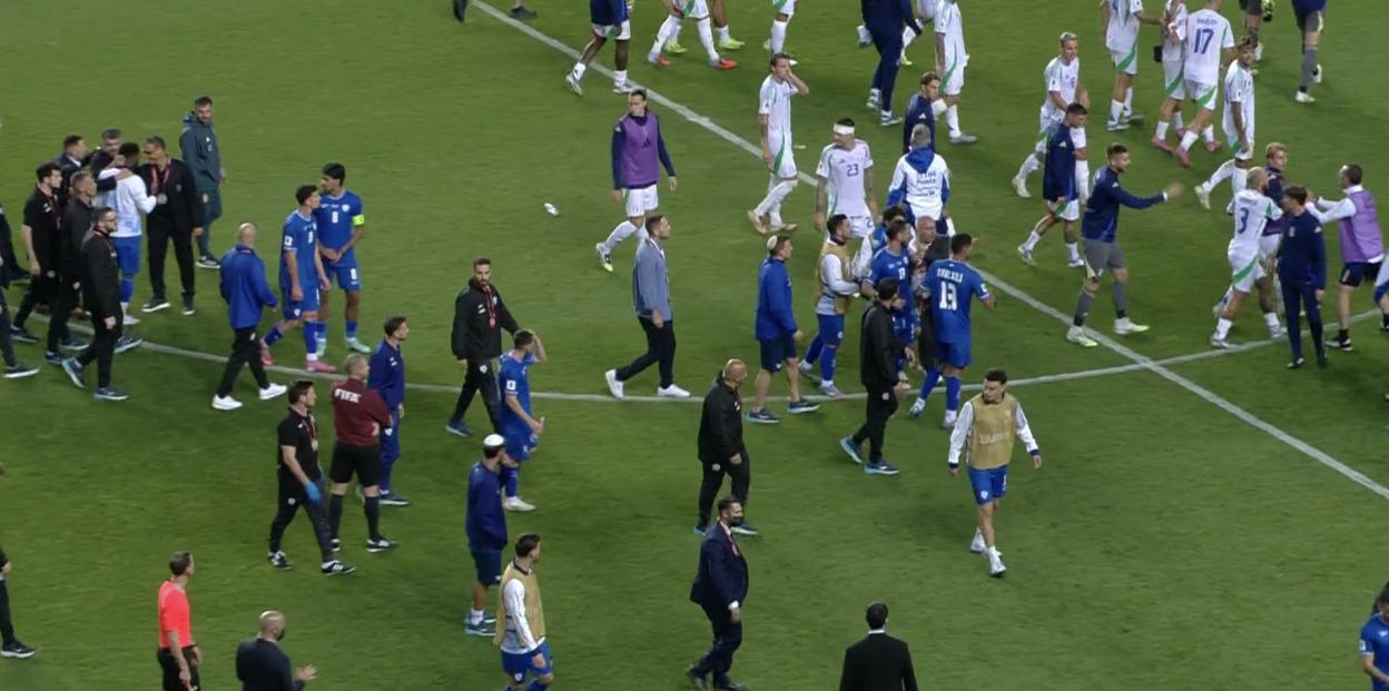 Gennaro Gattuso confronting an Israeli player after an Italy World Cup qualifying match.