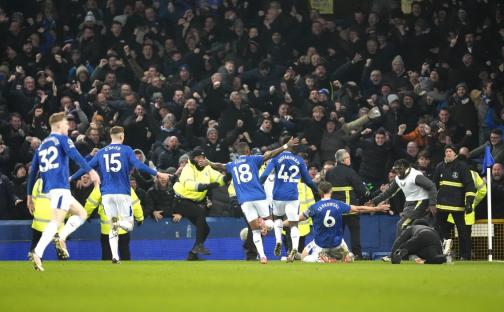Everton's James Tarkowski (centre) celebrates scoring their side's second goal of the game with team-mates in front of the fans during the Premier League match at Goodison Park, Liverpool. Picture date: Wednesday February 12, 2025. PA Photo. See PA story SOCCER Everton. Photo credit should read: Nick Potts/PA Wire. RESTRICTIONS: EDITORIAL USE ONLY No use with unauthorised audio, video, data, fixture lists, club/league logos or "live" services. Online in-match use limited to 120 images, no video emulation. No use in betting, games or single club/league/player publications.