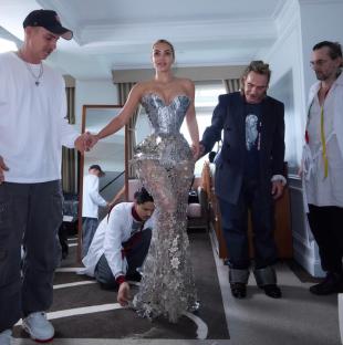 Kim Kardashian getting ready for the Met Gala, assisted by her team.