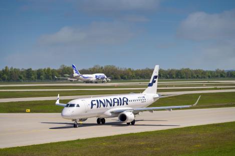 Finnair CRJ-900LR taxiing at Munich Airport.