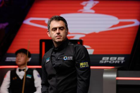 Ronnie O'Sullivan reacting during a snooker match.