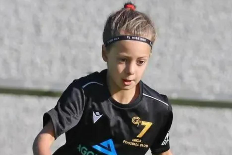 Girl, 10, died from head injuries after BMW smashed through fence on to pitch as she played football, inquest told