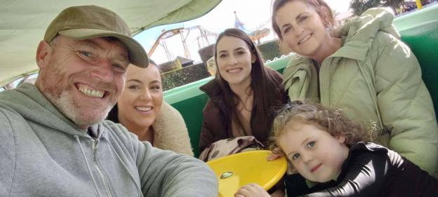 Family at an amusement park.