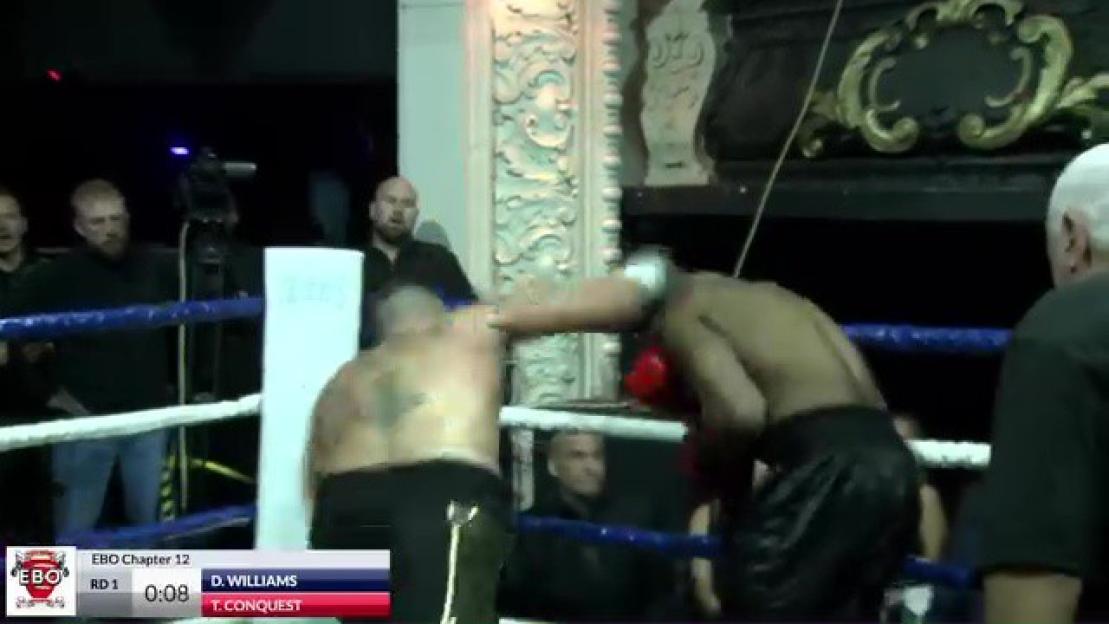 Two boxers in a ring with a timer showing "RD 1 0:08" and names D. WILLIAMS and T. CONQUEST.