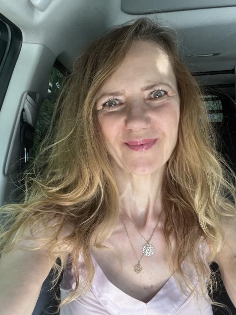 Selfie of journalist Sam Brick wearing makeup.