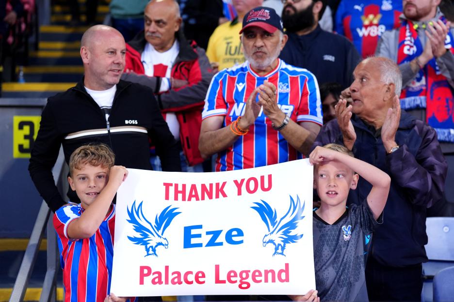 Crystal Palace fans holding a sign thanking Eberechi Eze.